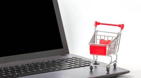 Shopping,Online,Concept,,laptop,With,Small,Shopping,Cart,For,Shopping