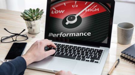High,Performance,Concept.,Man,Working,With,A,Computer,,Performance,Gauge